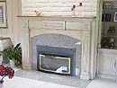 Mantel in Limestone finish with oak top 